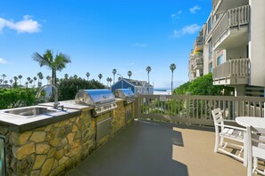 Outdoor dining - Beachfront Luxury, High end upper level cottage, North Coast Village A22 (Oceanside)