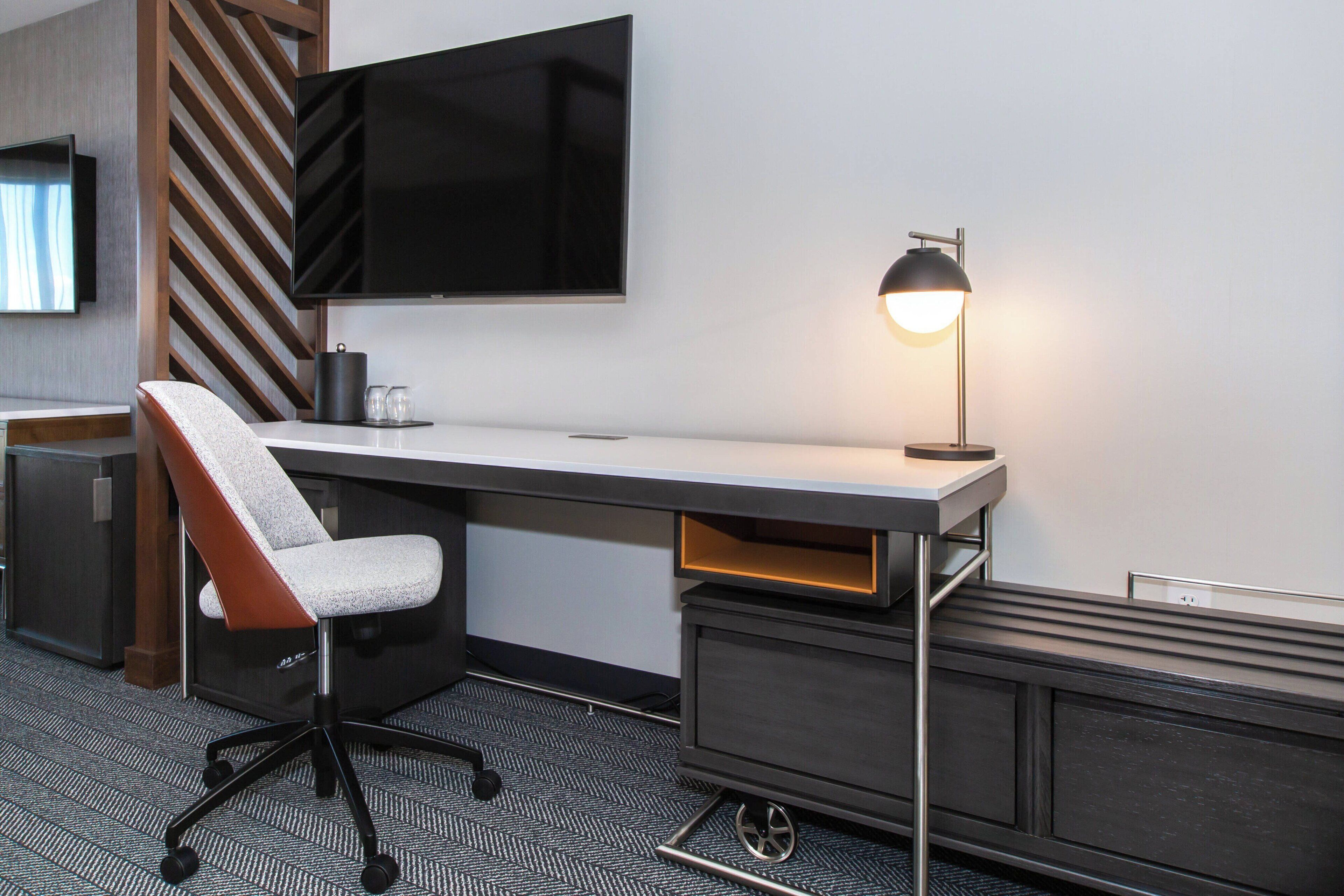 suite, multiple beds, courtyard view | desk, blackout curtains, iron/ironing board, free cots/infant beds