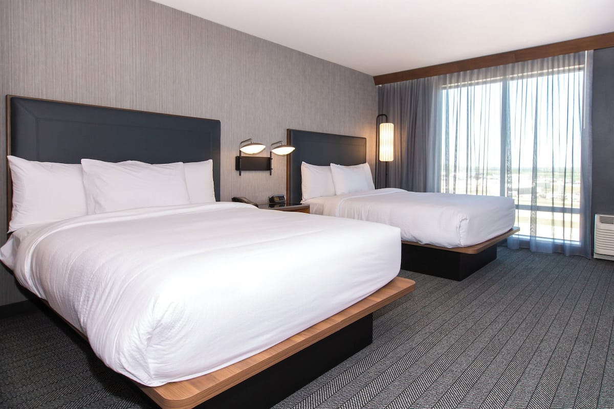 room, 2 queen beds | desk, blackout curtains, iron/ironing board, free cots/infant beds