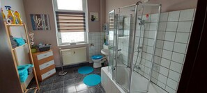 Combined shower/tub, hair dryer, towels, soap