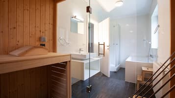Bathtub, hair dryer, toilet paper
