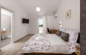 3 Schlafzimmer, Zimmersafe, kostenloses WLAN, Bettwäsche