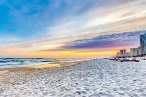 On the beach, sun-loungers, beach towels