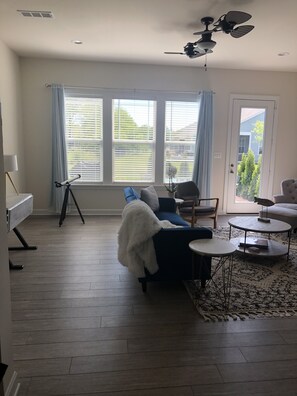 Smart TV, fireplace, table football, books