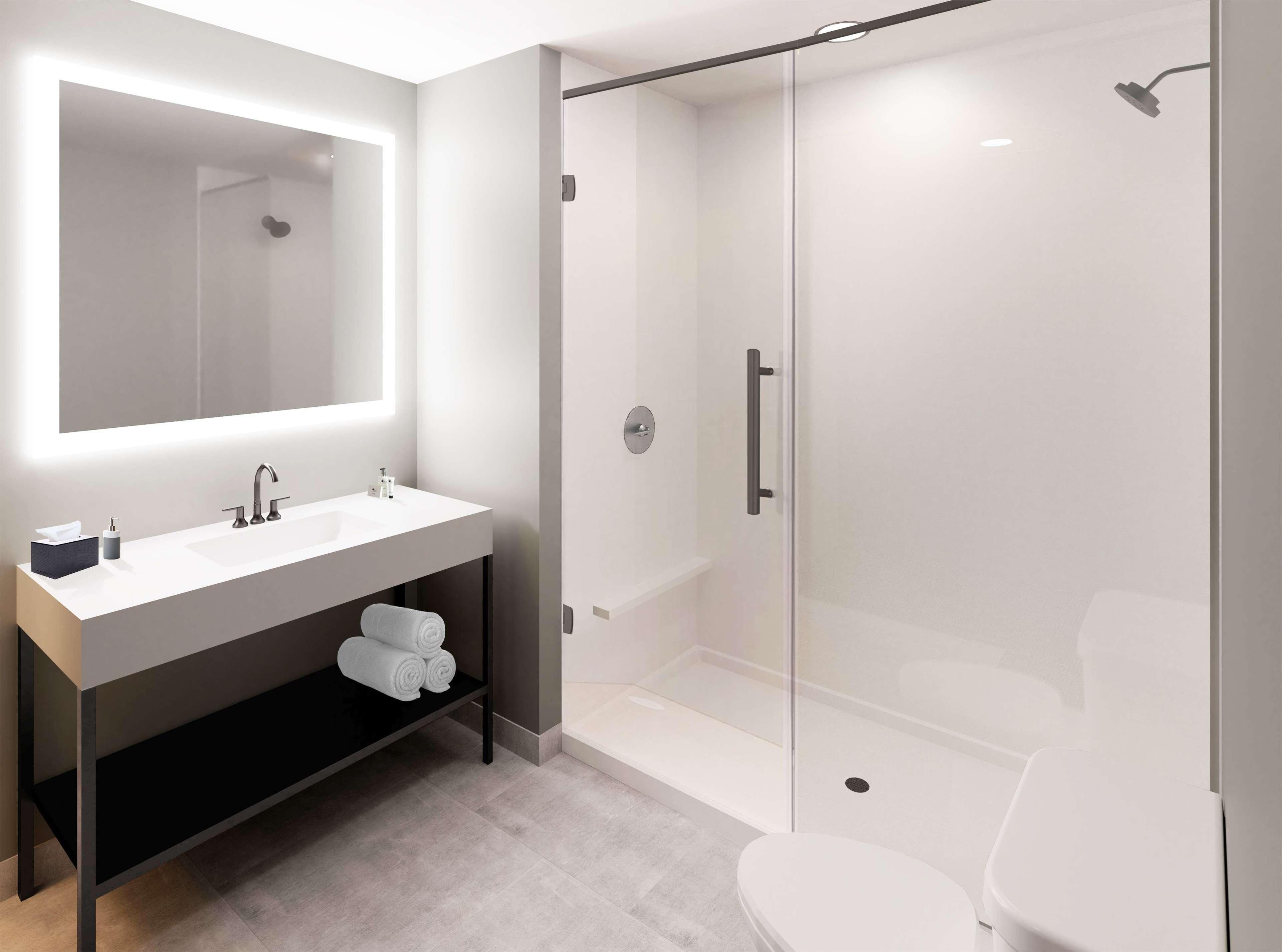 Bathroom | Rainfall showerhead, hair dryer, towels