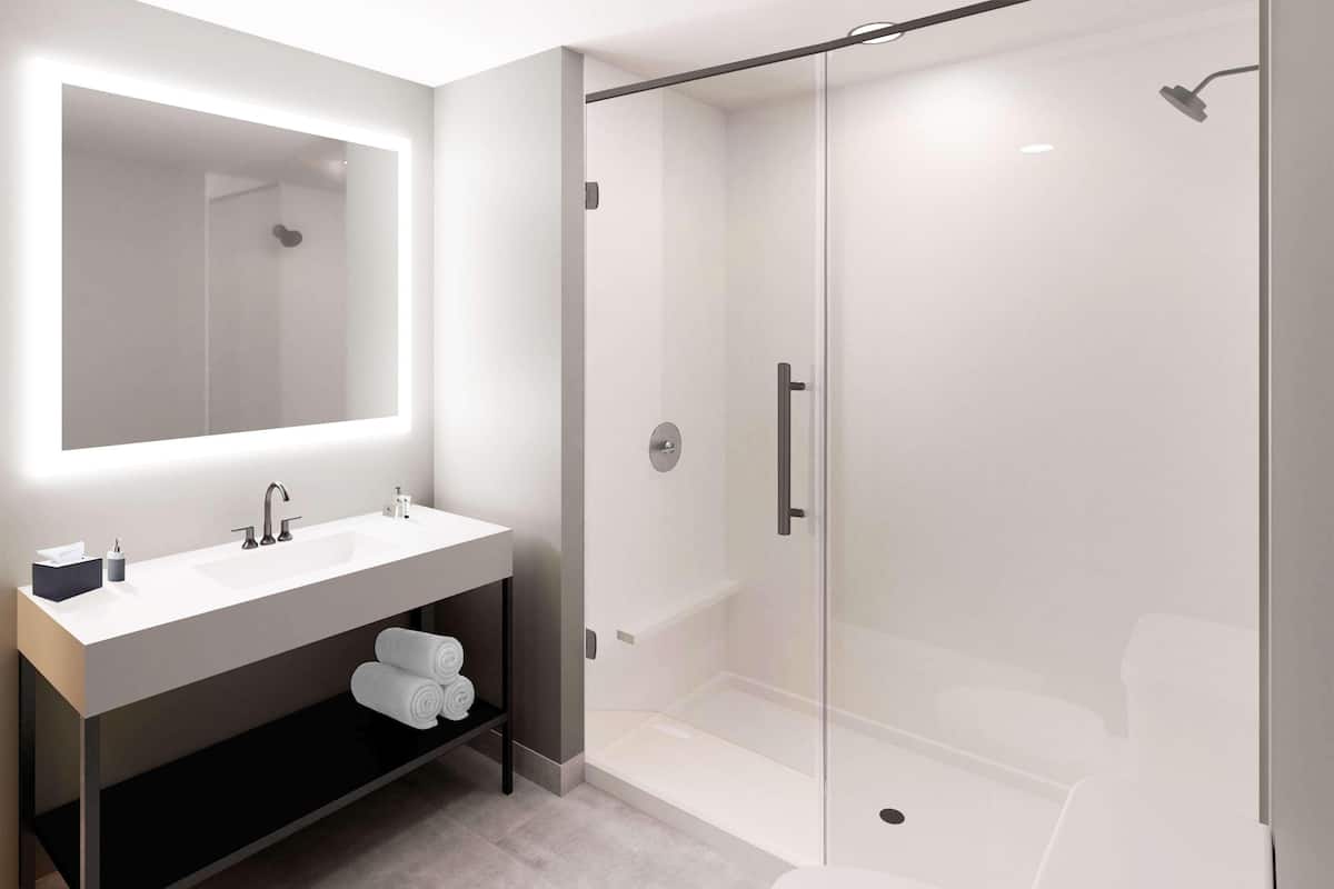 Bathroom | Rainfall showerhead, hair dryer, towels