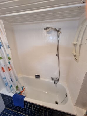 Combined shower/tub, hair dryer