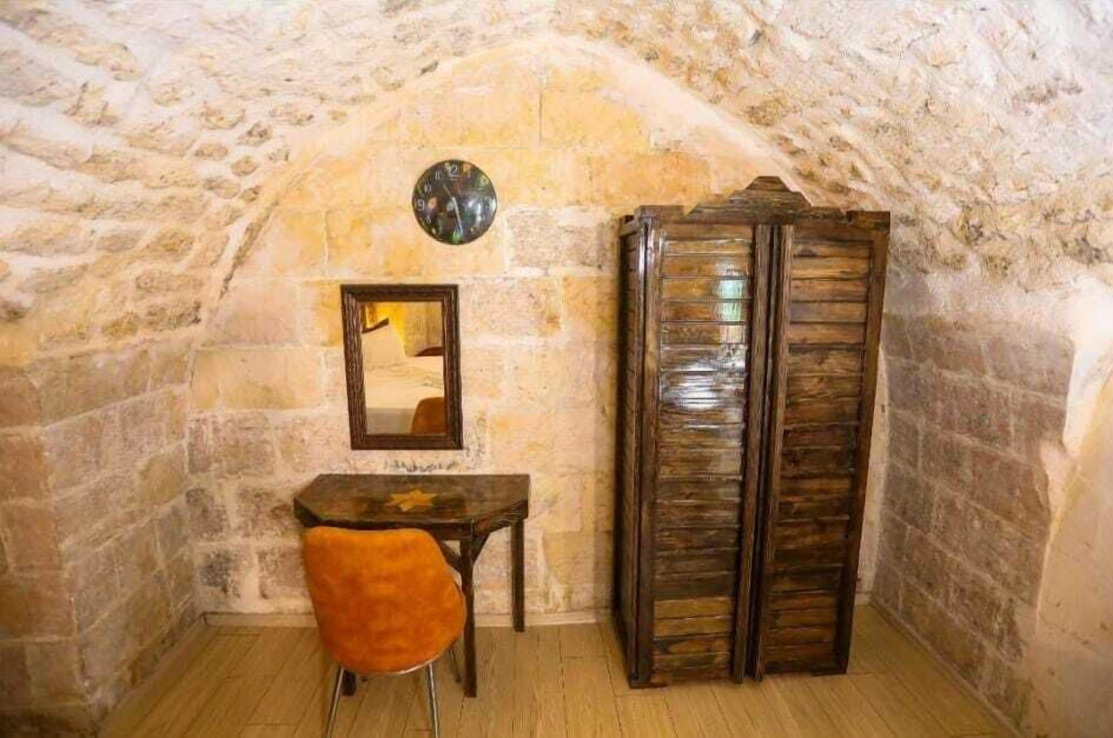 deluxe studio suite | individually decorated, individually furnished, desk, laptop workspace