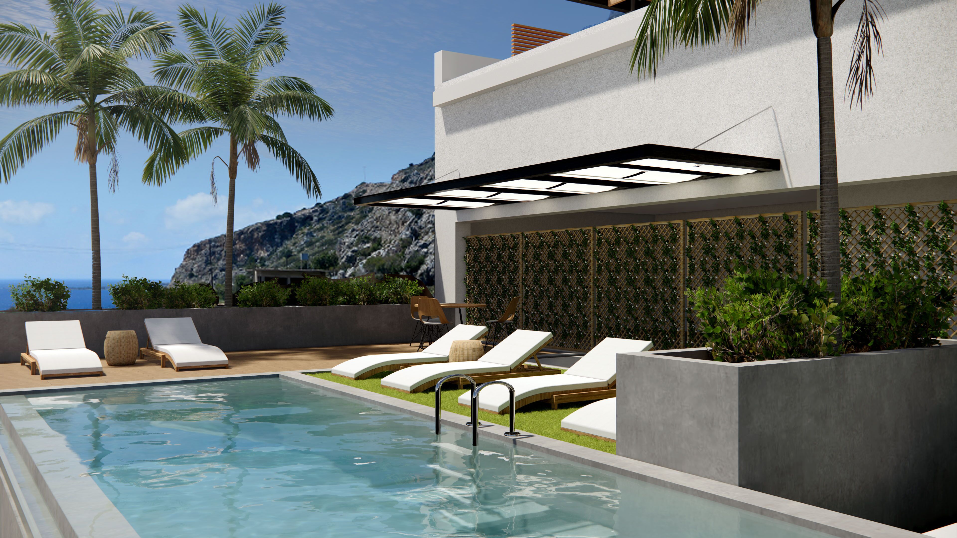 A modern outdoor pool area with lounge chairs, a pool, and a view of the ocean.