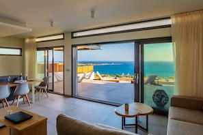 Grand Suite, 2 Bedrooms, Private Pool | Living area | Flat-screen TV