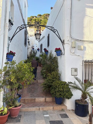 Modern ground floor apartment with large private patio/terrace and shared pool 