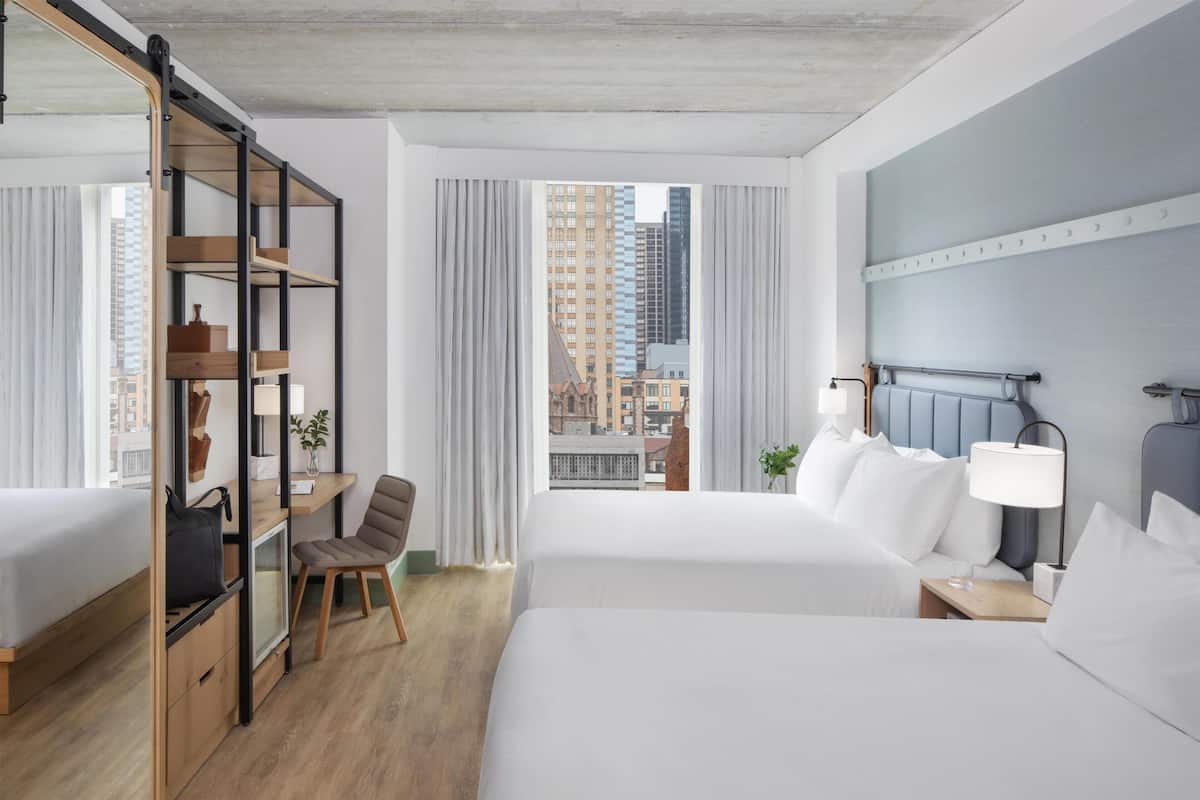 Hypo-allergenic bedding available, in-room safe, desk, laptop workspace
