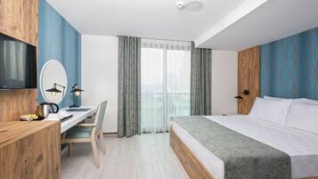 Superior Double Room | Minibar, desk, laptop workspace, iron/ironing board