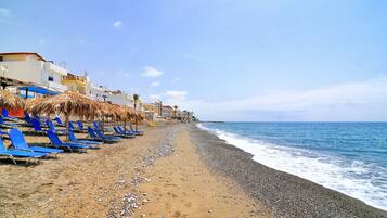 On the beach, beach towels
