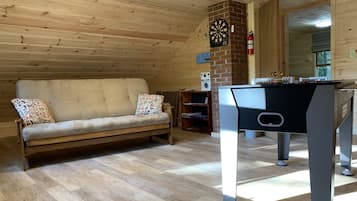 Smart TV, DVD player, foosball, video library