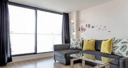 Clean and modern Riverside Flat w/ Private Balcony