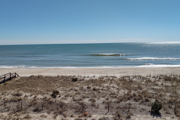 Na praia, toalhas de praia