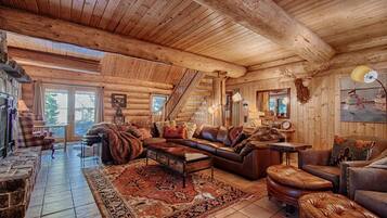 Cabin, Multiple Beds (McKinney Creek Cabin - Walk to Chambe) | Living room | TV, fireplace, DVD player