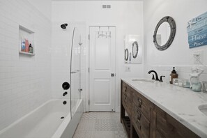Combined shower/bathtub, hair dryer