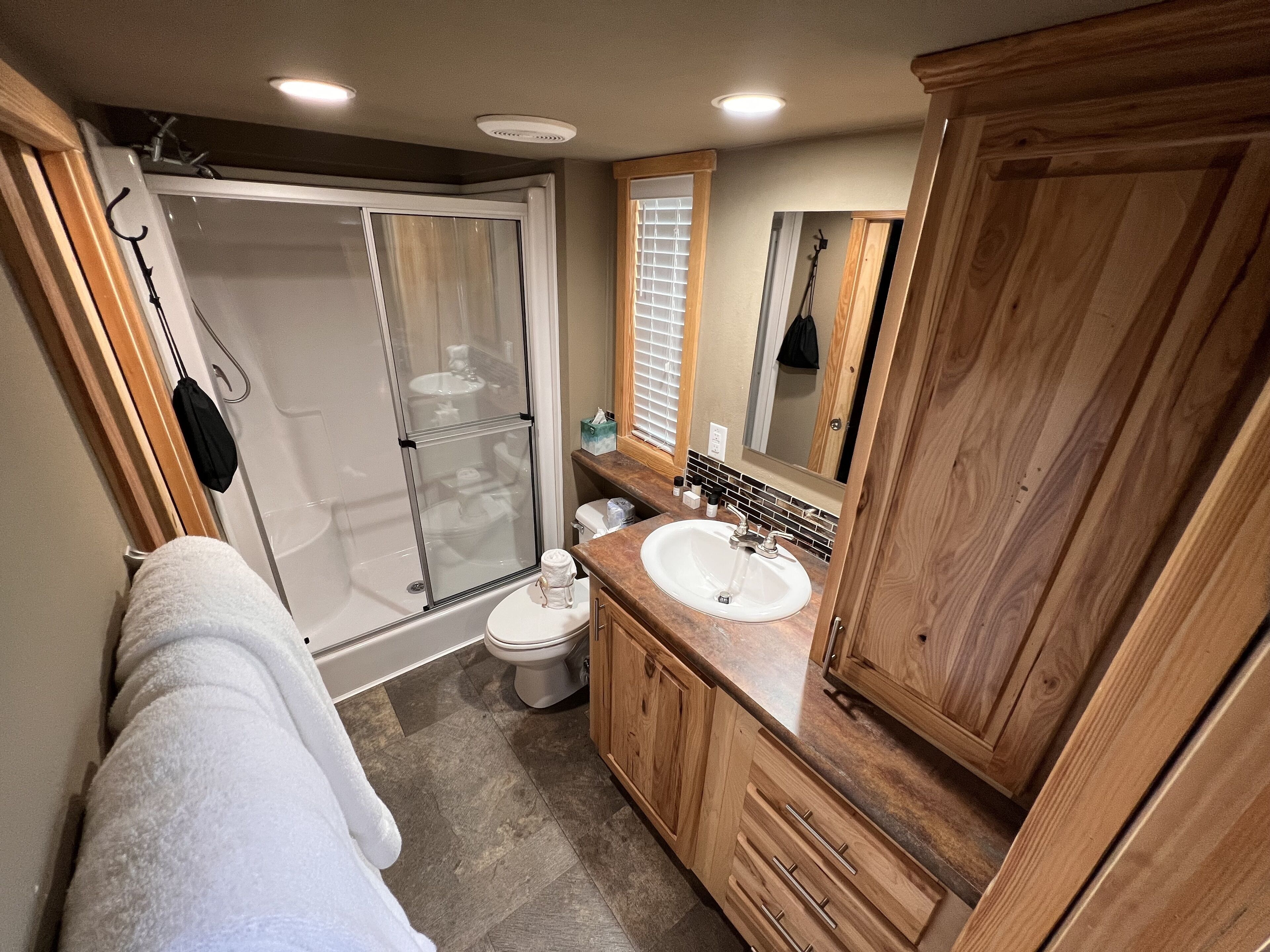 cabin | bathroom | shower, hair dryer, towels, soap