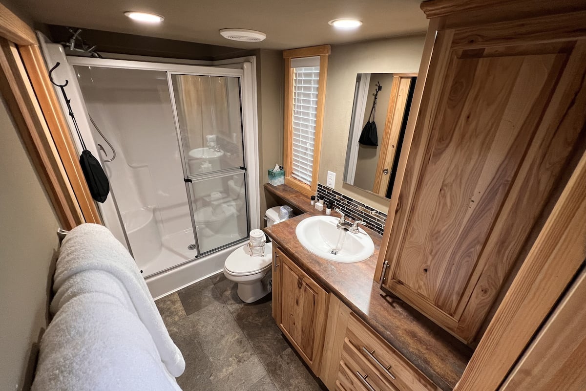 cabin | bathroom | shower, hair dryer, towels, soap