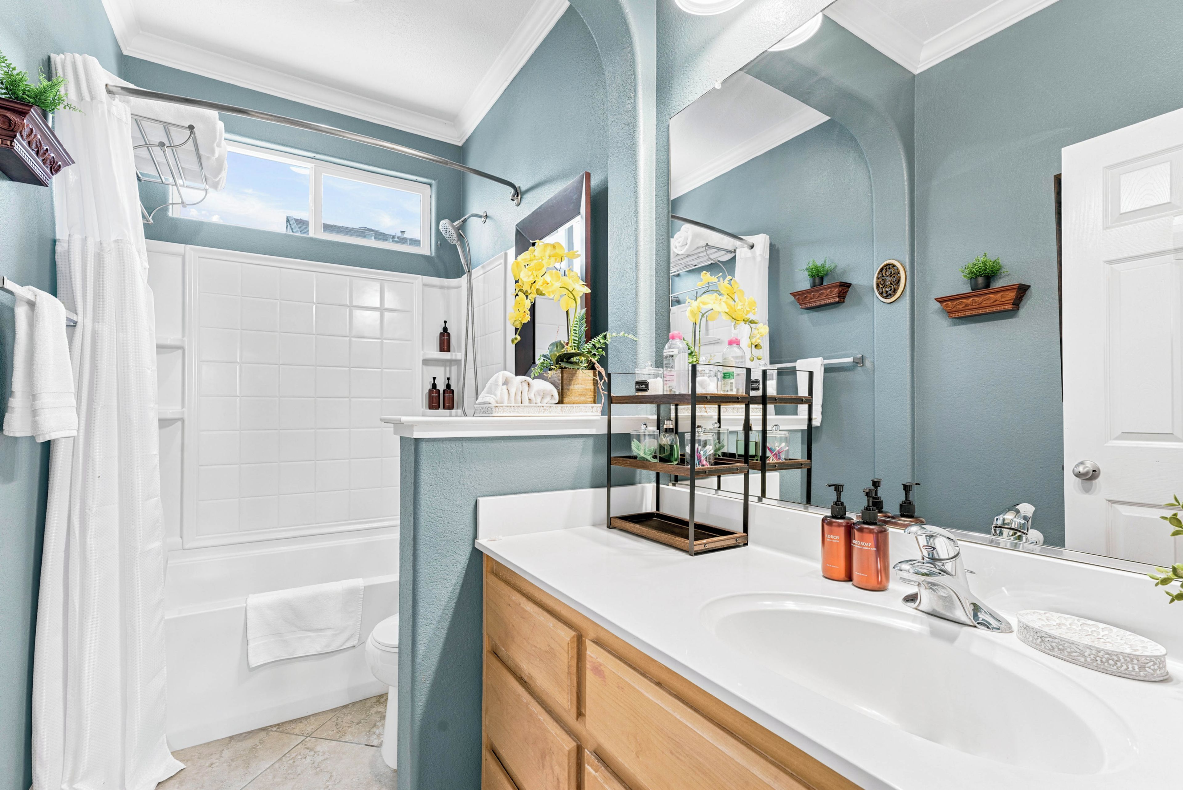 Combined shower/tub, hair dryer, towels, soap