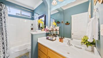 Combined shower/tub, hair dryer, towels, soap