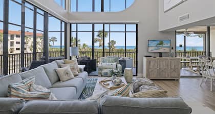Gulf Front two story townhouse with a coastal flair! Incredible place for family gatherings!!