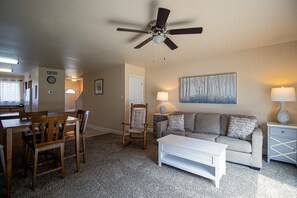 Condo, 2 Queen Beds, Private Pool | Living room | 42-inch TV with cable channels, MP3 dock