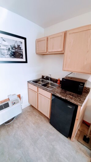 Deluxe Double Room, 2 Double Beds | Private kitchenette | Mini-fridge, microwave, coffee/tea maker