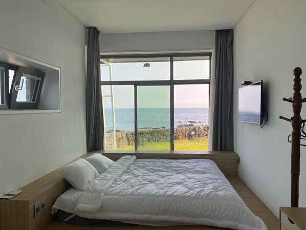 Habitación doble, vista al océano (105) | Espacio para trabajar con laptop y wifi gratis