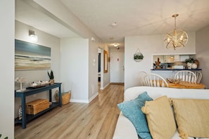 TV, books - Southern Beauty: Oceanfront Condo with Community Pool (Caswell Beach)