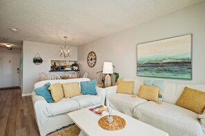 TV, books - Southern Beauty: Oceanfront Condo with Community Pool (Caswell Beach)