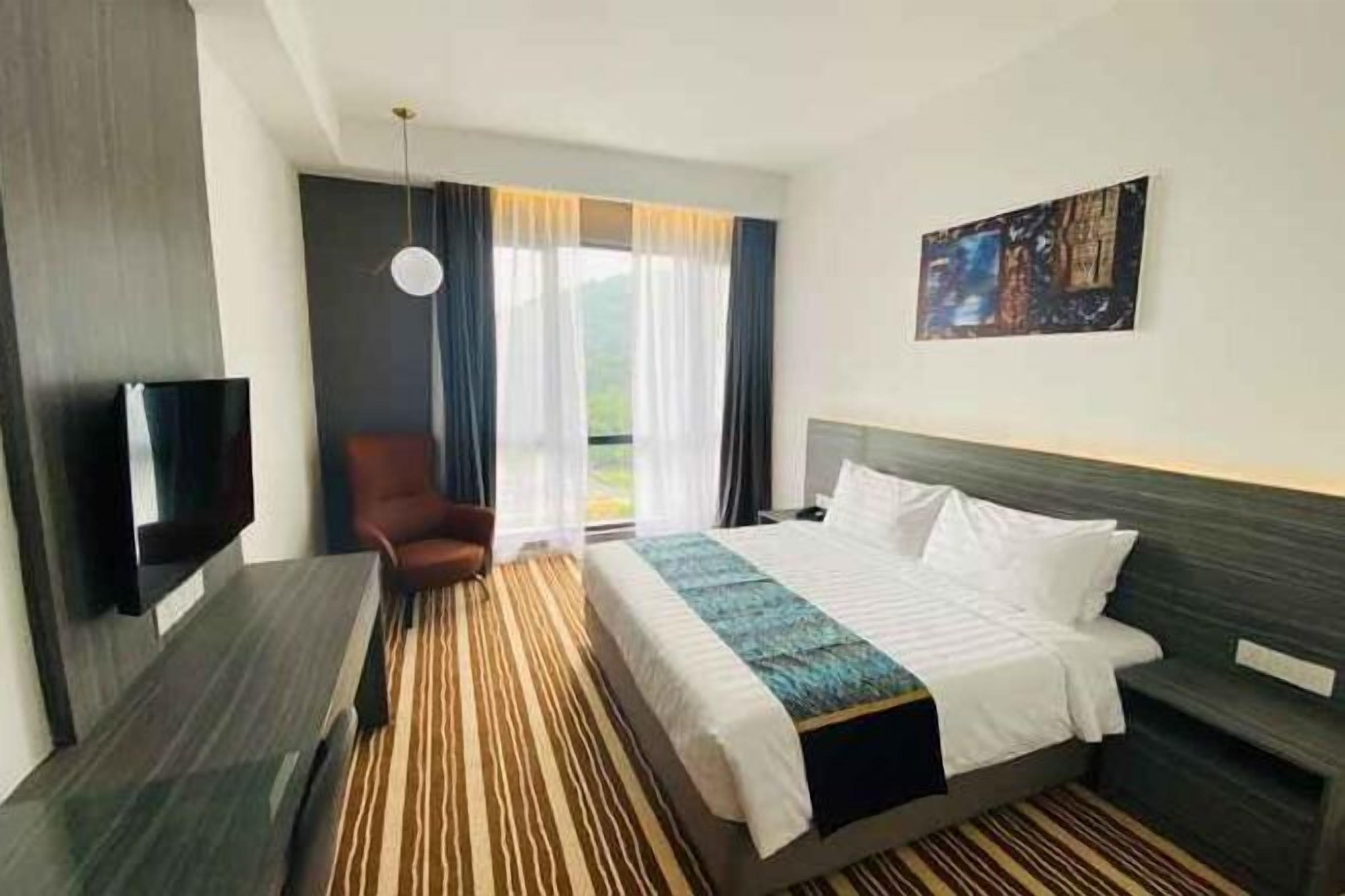 Free minibar, in-room safe, desk, laptop workspace