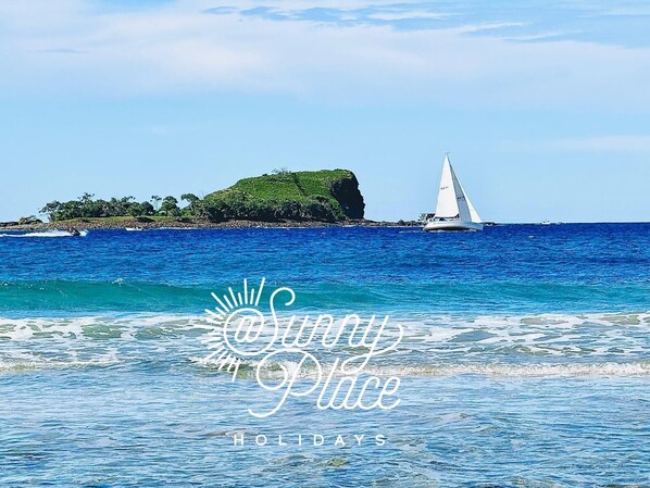 On the beach, sun loungers, beach towels