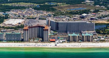 Condo with a gulf view, pools, beach access, gym, on-site dining, and $300 of Free Activities Daily!