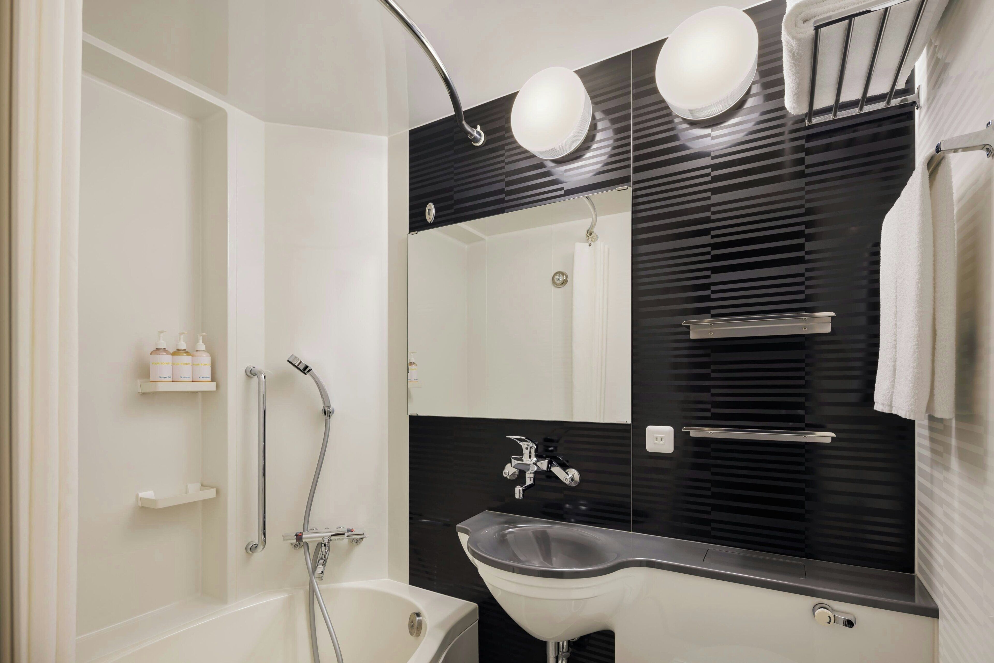 combined shower/bathtub, deep-soaking bathtub, free toiletries