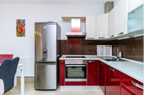 Fridge, stovetop, espresso maker, electric kettle
