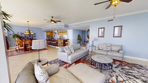 Flat-screen TV, DVD player, books, stereo