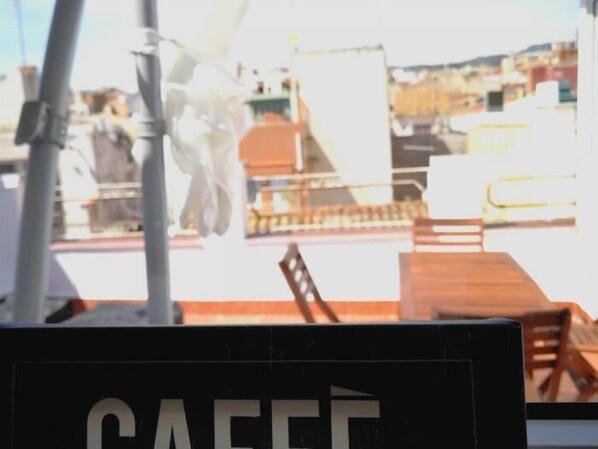 A sign with the word 'CAFE' in a cafe setting.