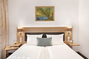 Couette en duvet d'oie, coffres-forts dans les chambres, bureau