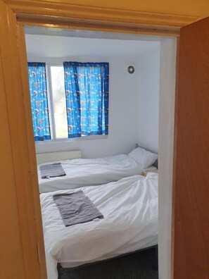 Quarto quádruplo standard, várias camas (Shared) | Ferros/tábuas de passar roupa, camas extras/dobráveis (sobretaxa)