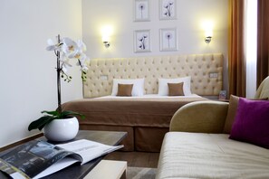 Suite familiar | 1 habitación, caja de seguridad en la habitación y cortinas blackout 