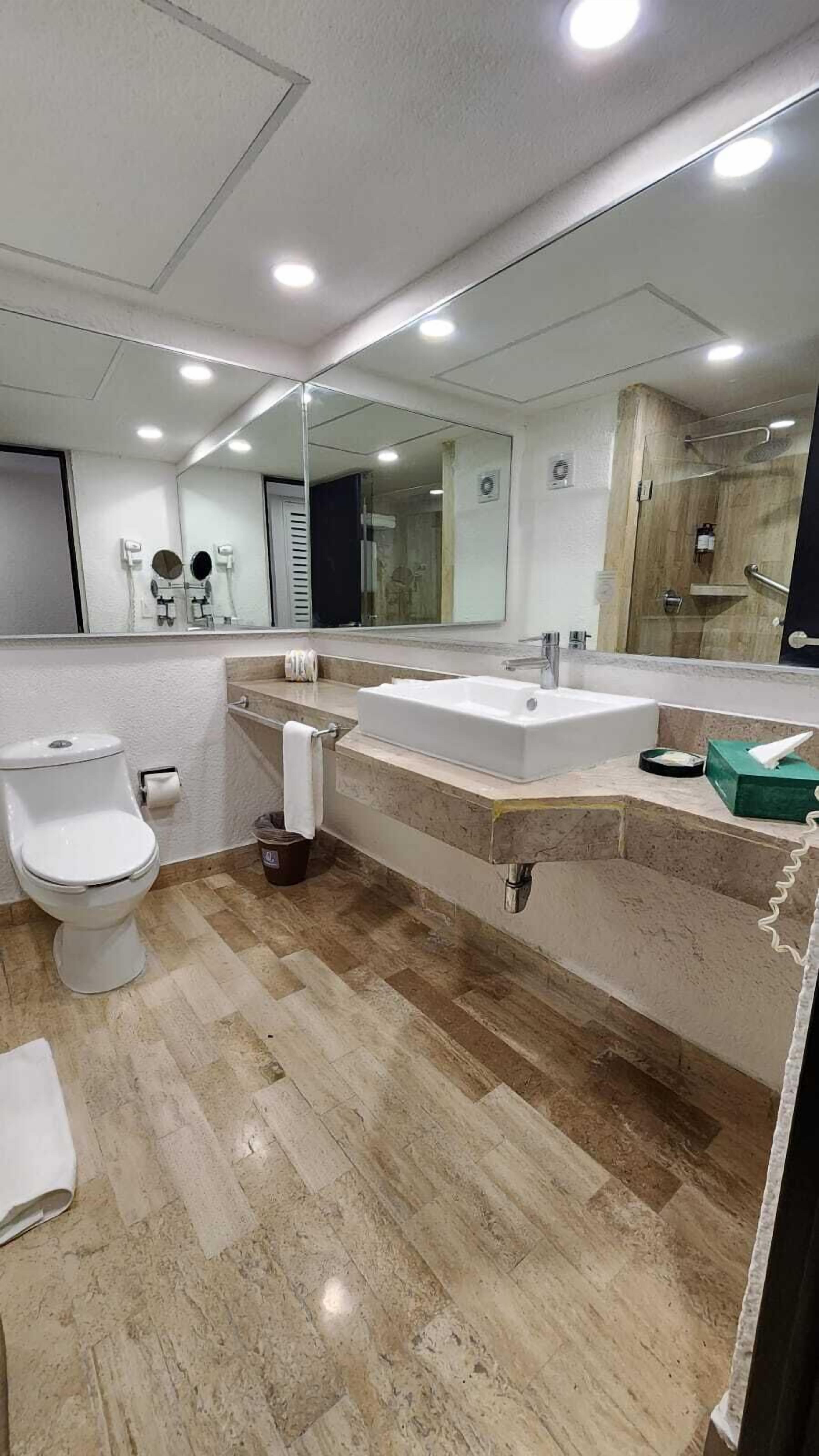 shower, rainfall showerhead, designer toiletries, hair dryer