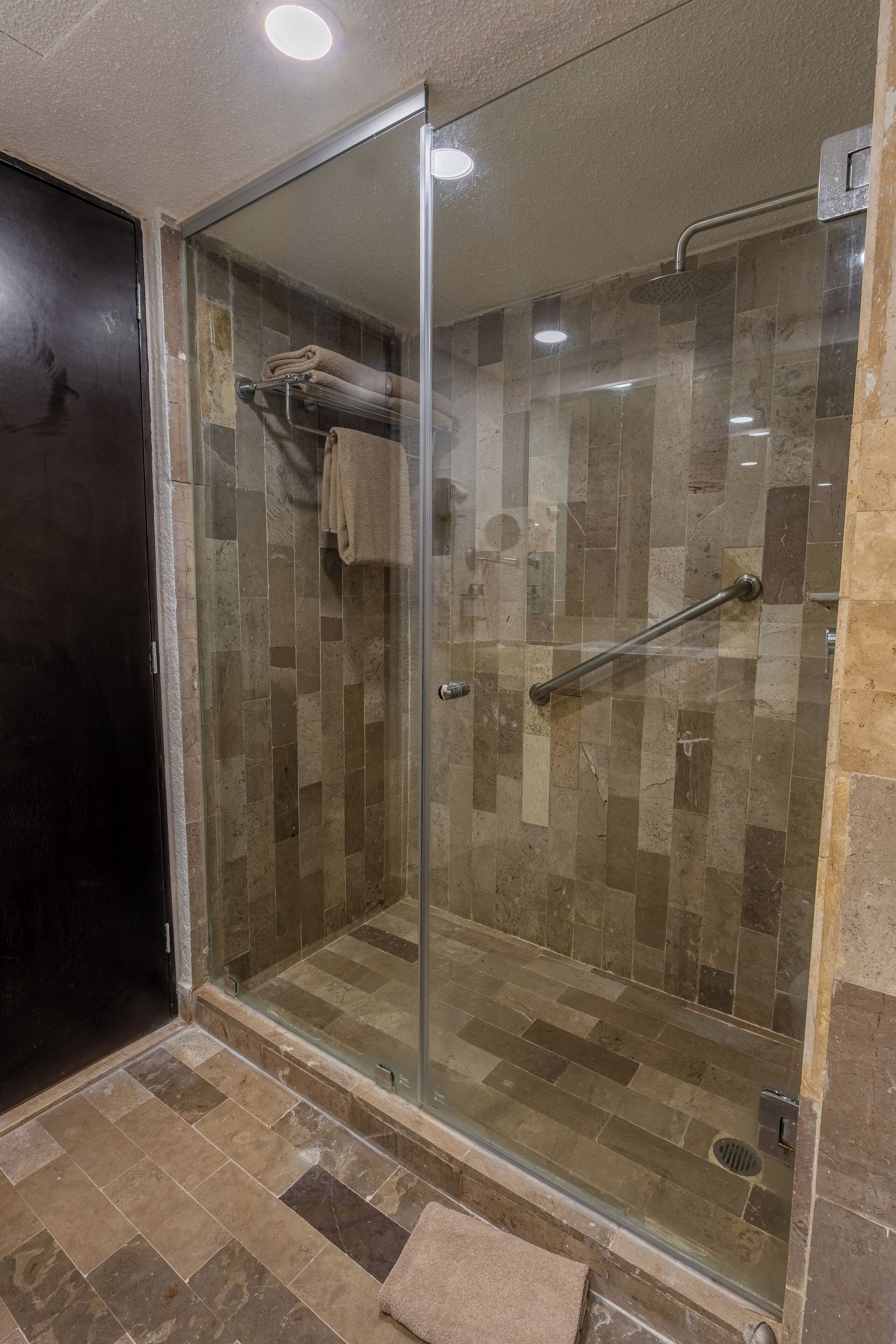 shower, rainfall showerhead, designer toiletries, hair dryer