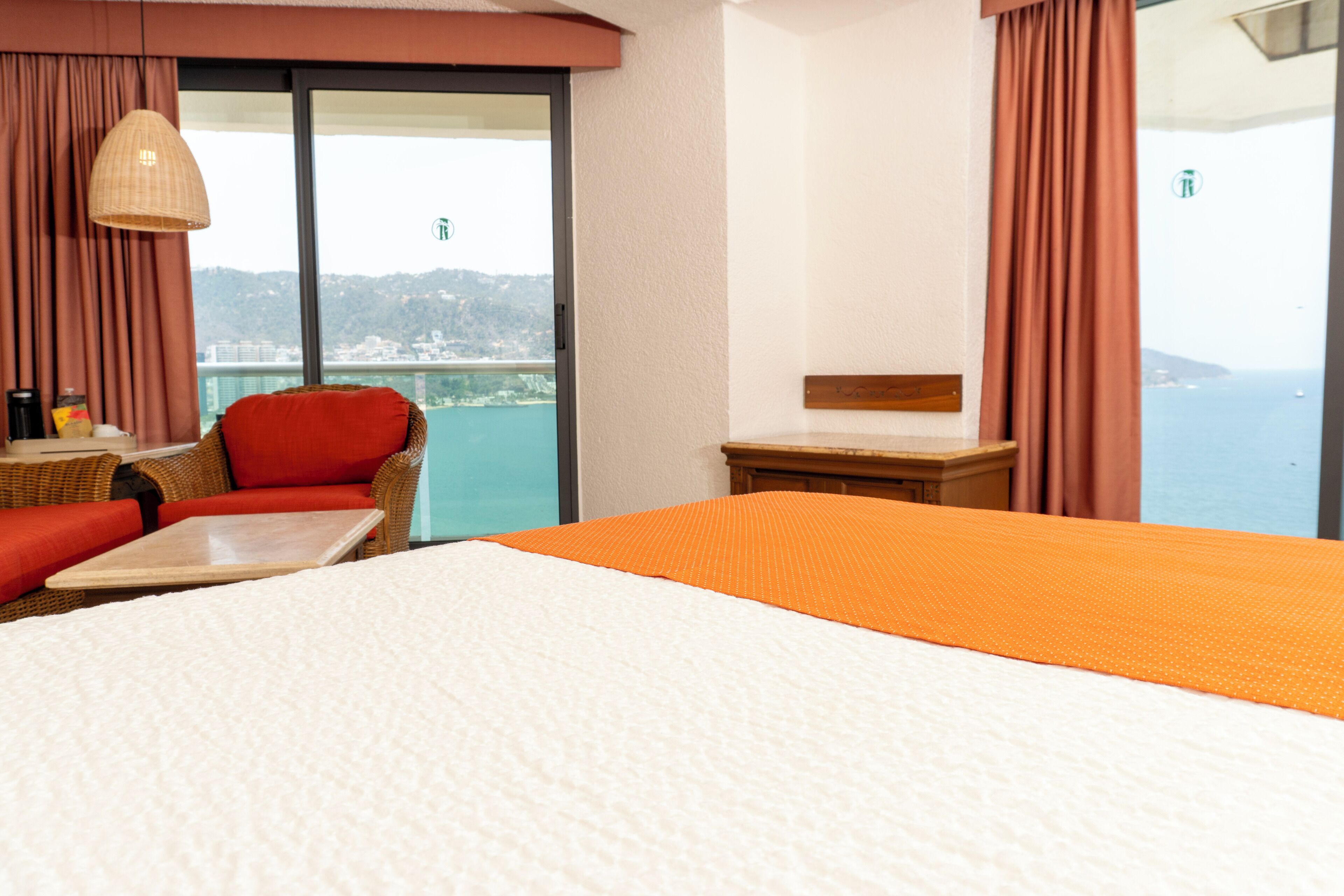 junior double room, 1 king bed, ocean view | bathroom | shower, rainfall showerhead, designer toiletries, hair dryer