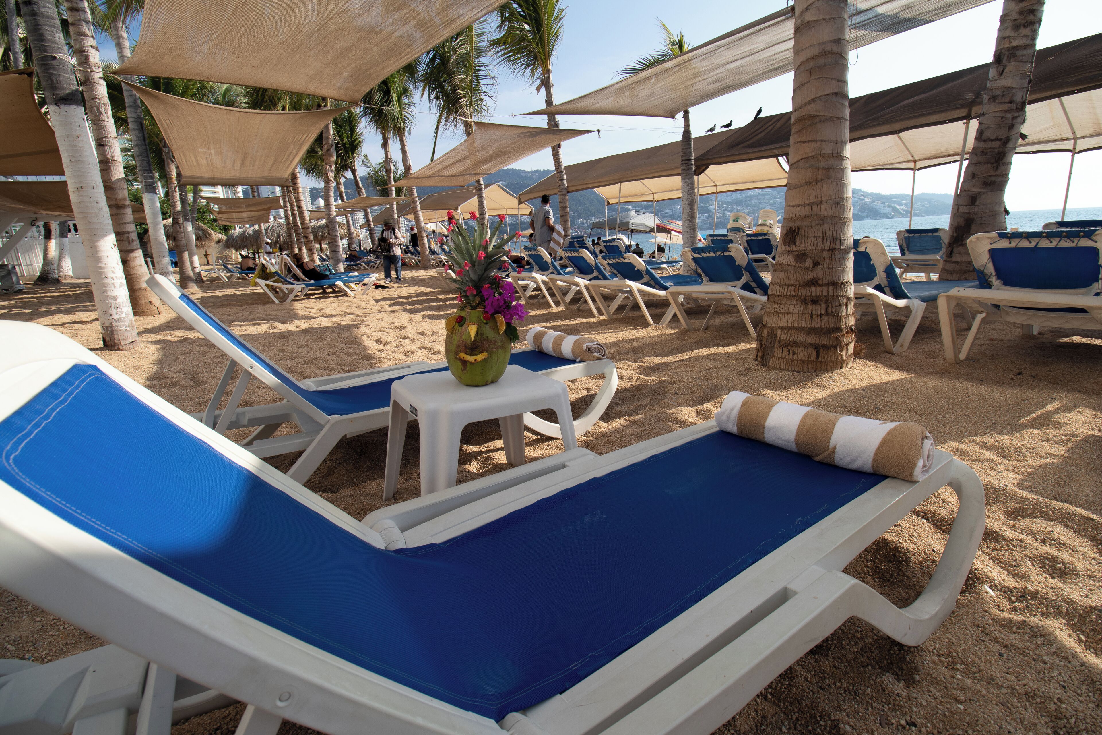 On the beach, free beach cabanas, sun loungers, beach towels