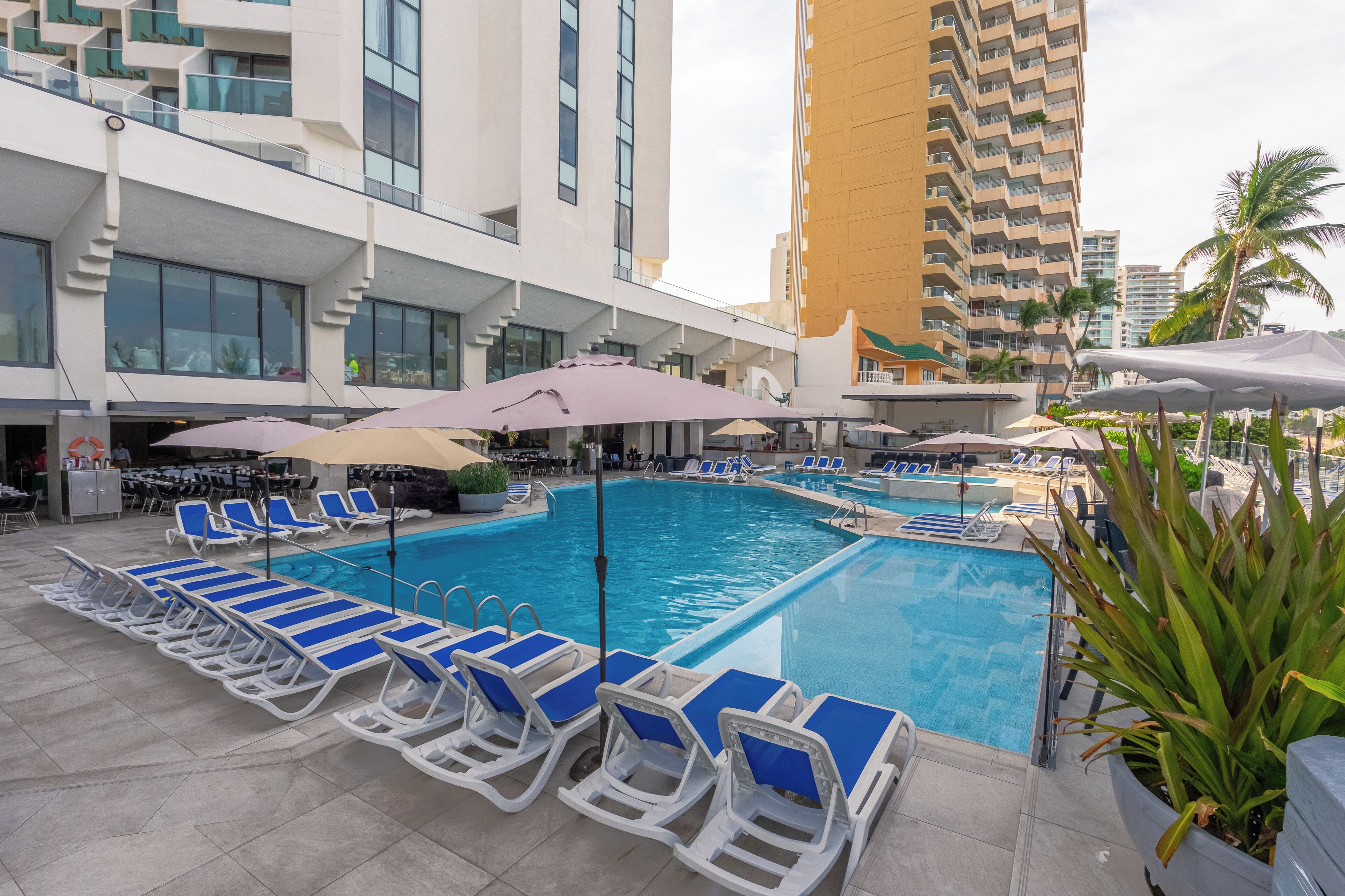 outdoor pool, open 8:00 am to 9:00 pm, pool umbrellas, pool loungers