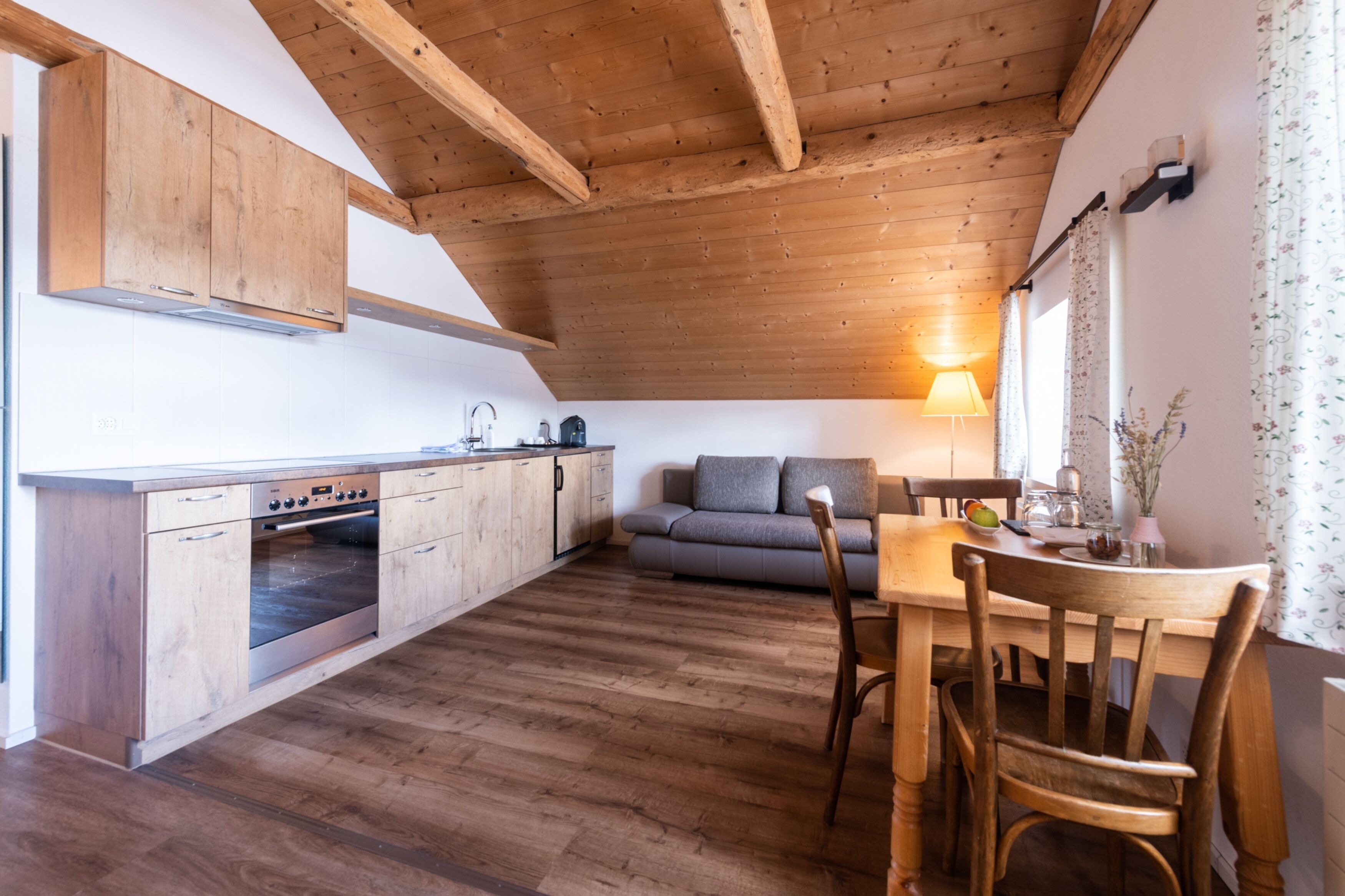 deluxe double room | living area | 70-cm flat-screen tv with cable channels, tv