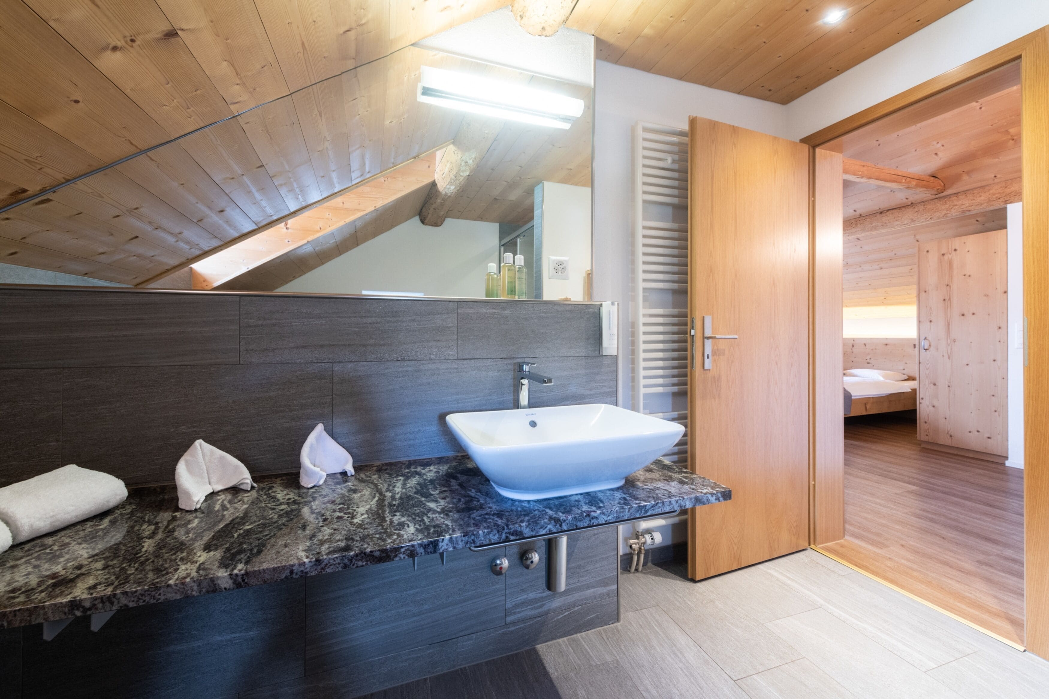 deluxe double room | bathroom | hair dryer, bathrobes, towels, soap